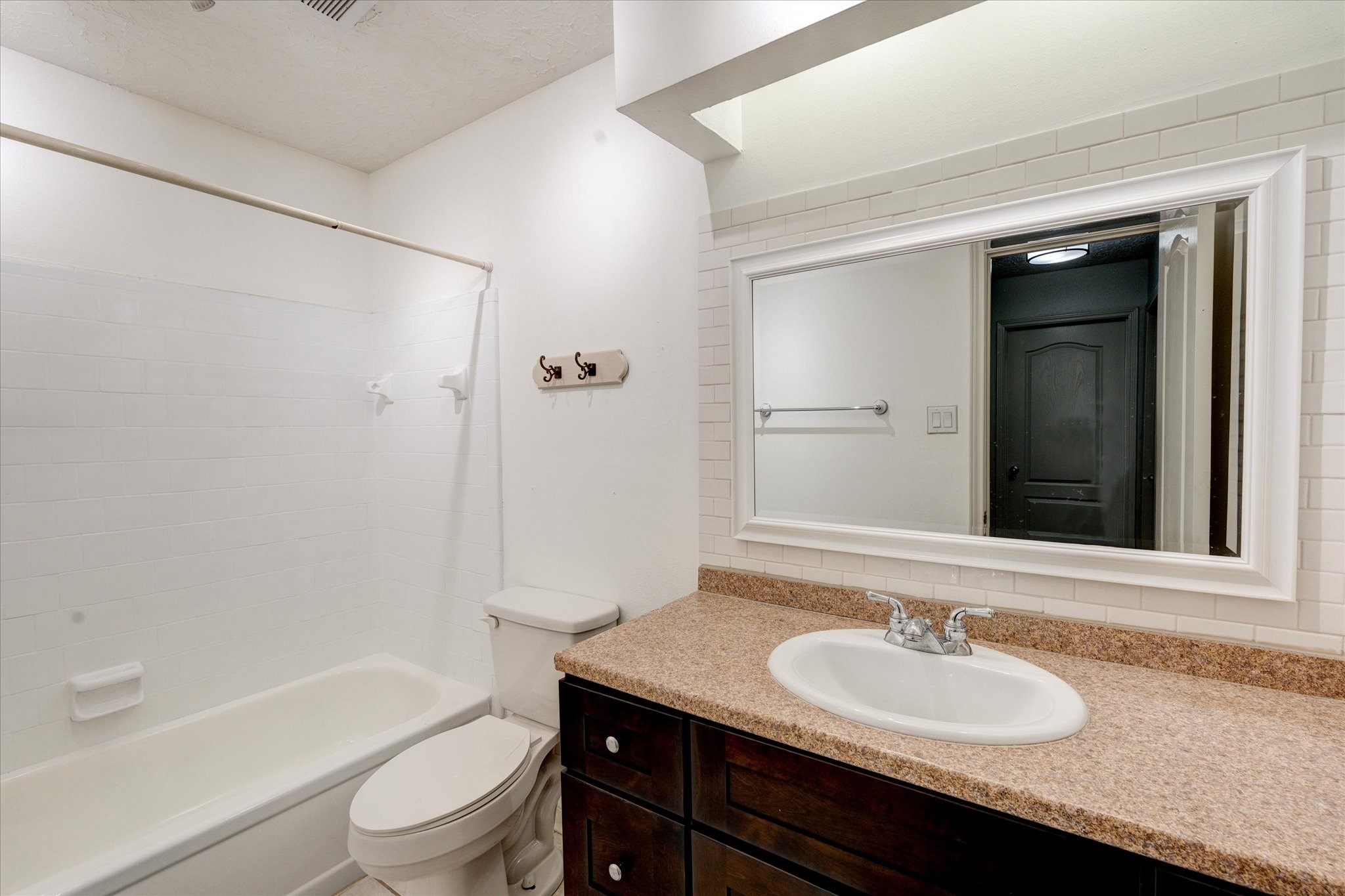 3726 Acorn Run Lane Spring, TX 77389 - Photo 18 of 27 a bathroom with a granite countertop sink toilet and shower