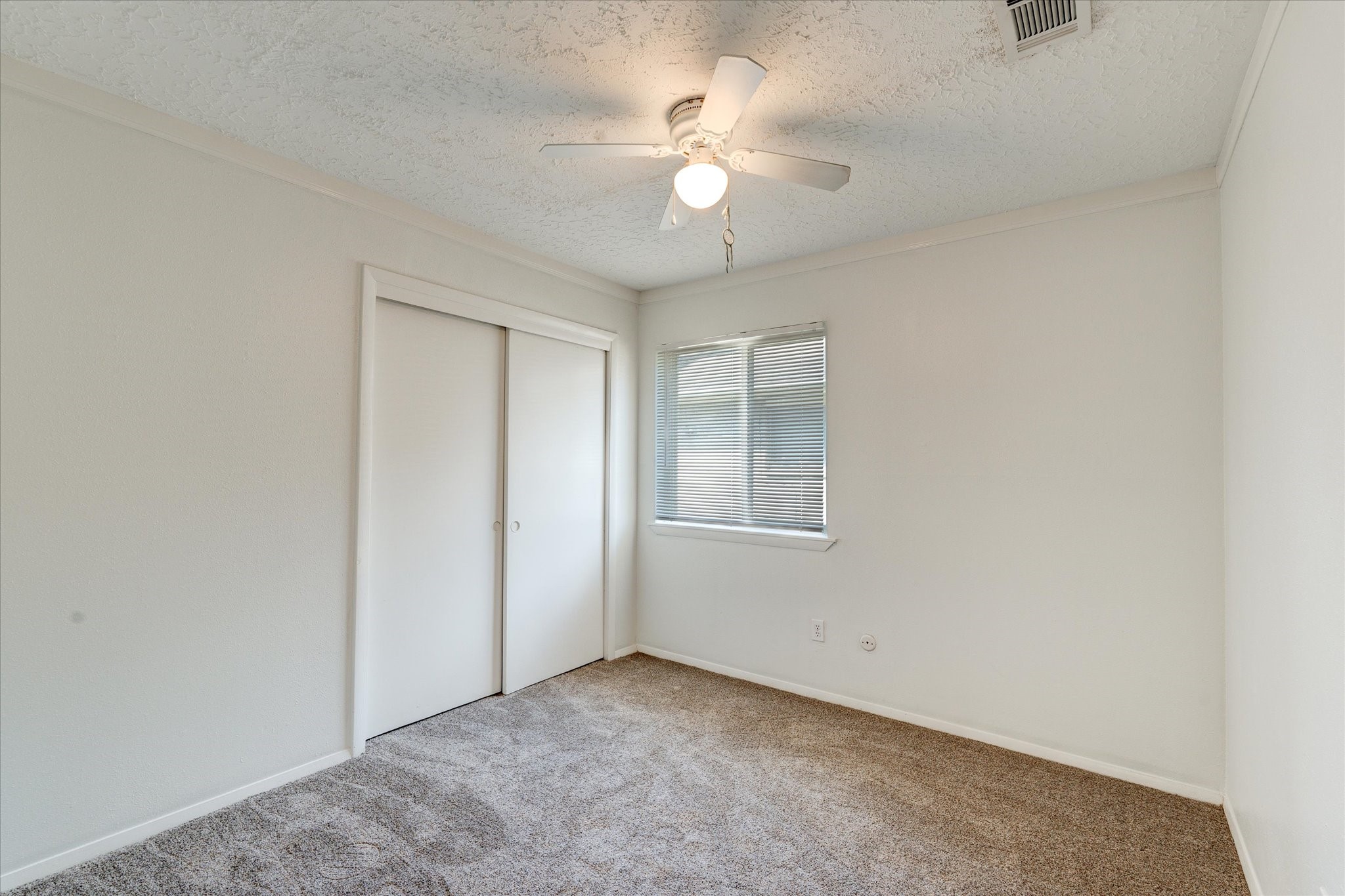 3726 Acorn Run Lane Spring, TX 77389 - Photo 21 of 27 an empty room with windows and fan