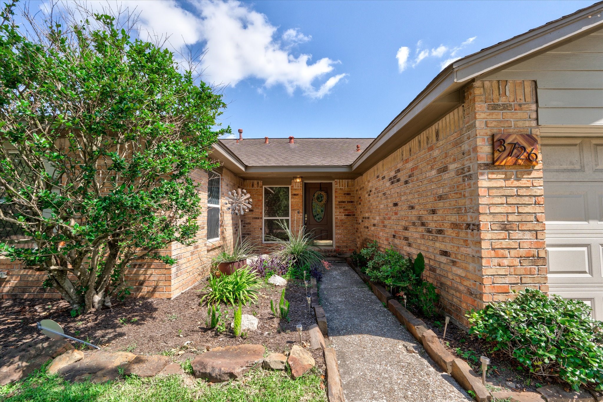 3726 Acorn Run Lane Spring, TX 77389 - Photo 3 of 27 a front view of a house with garden