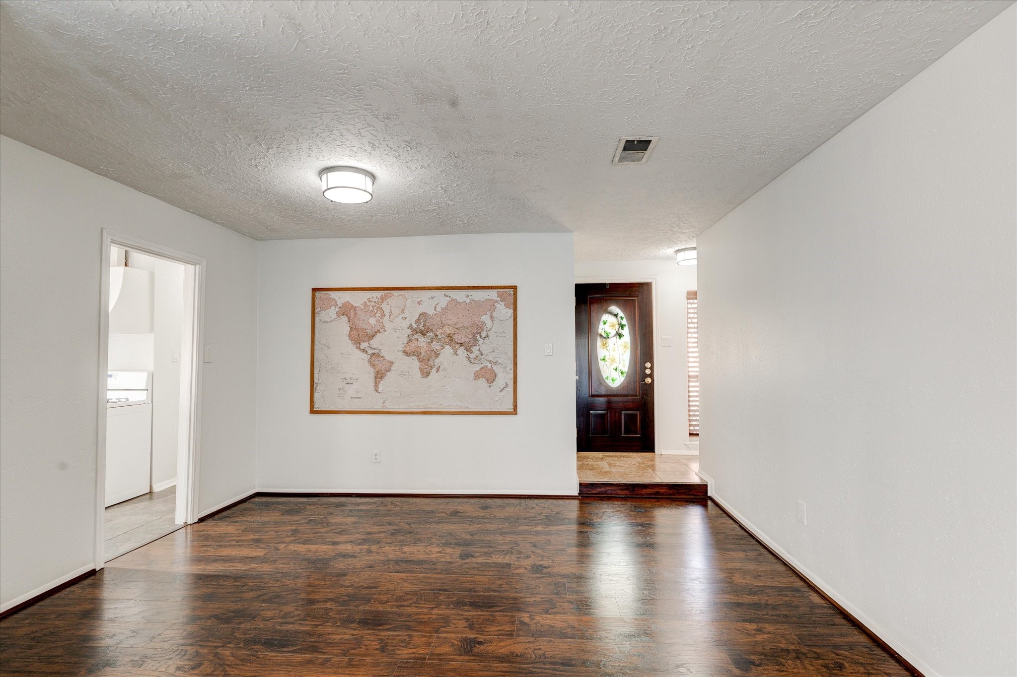 3726 Acorn Run Lane Spring, TX 77389 - Photo 4 of 27 an empty room with wooden floor and windows