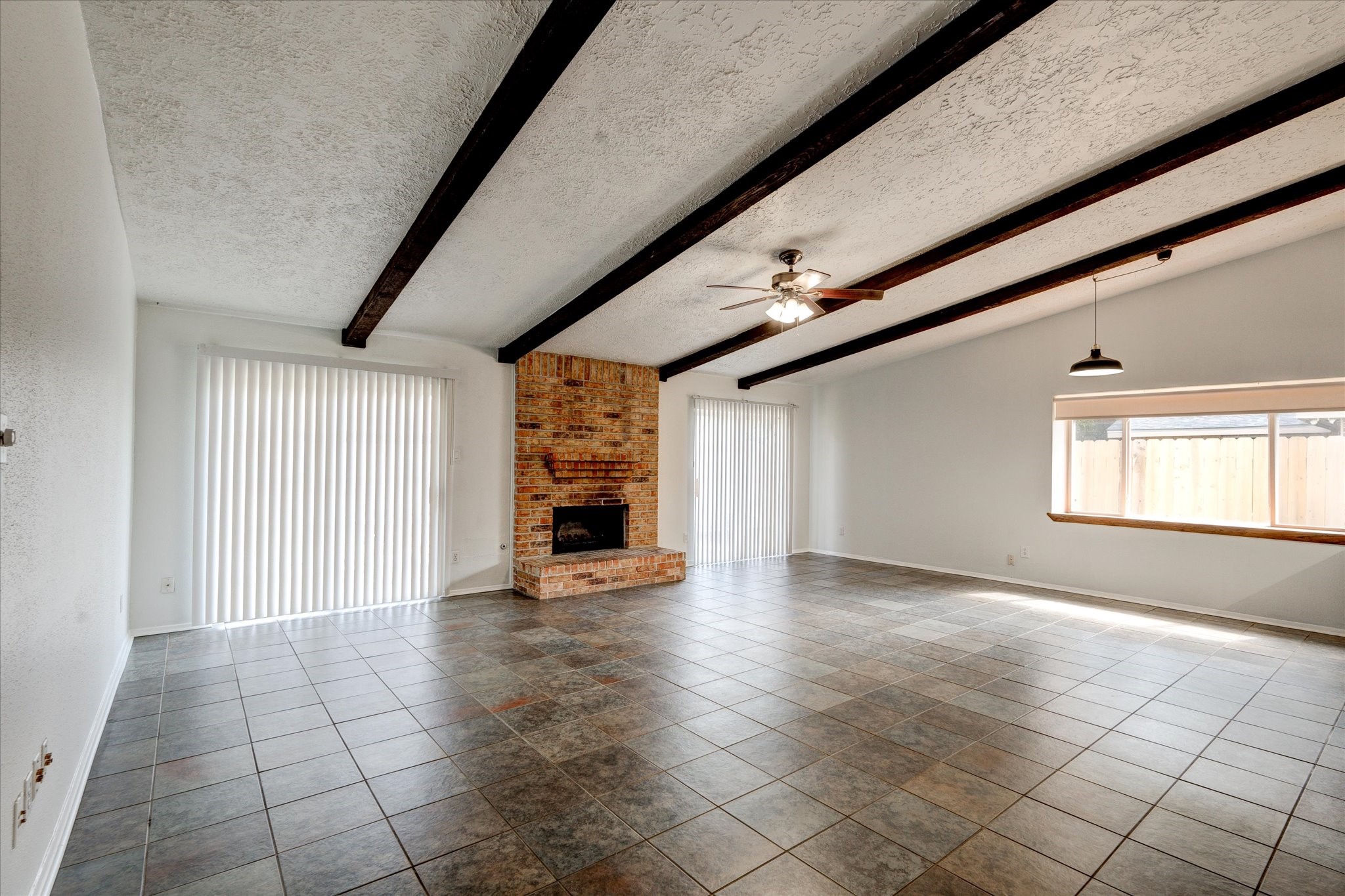 3726 Acorn Run Lane Spring, TX 77389 - Photo 5 of 27 a view of empty room with wooden floor and fireplace