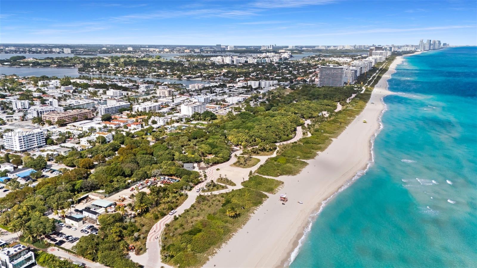 8041 Harding Avenue, Unit 105 Miami Beach, FL 33141 - Photo 21 of 23 an aerial view of residential houses with outdoor space