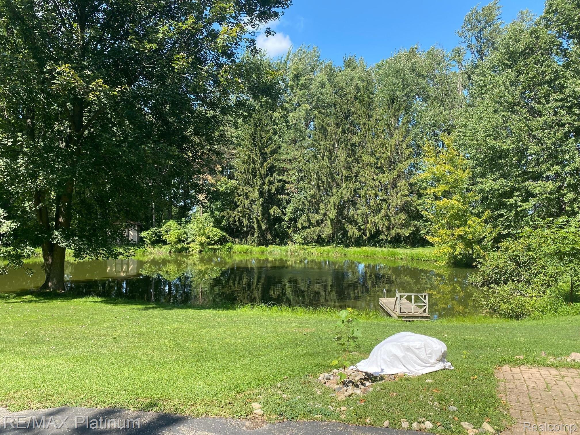 6081 Spaulding Road Howell, MI 48855 - Photo 2 of 15 20 Foot Deep Treated Pond