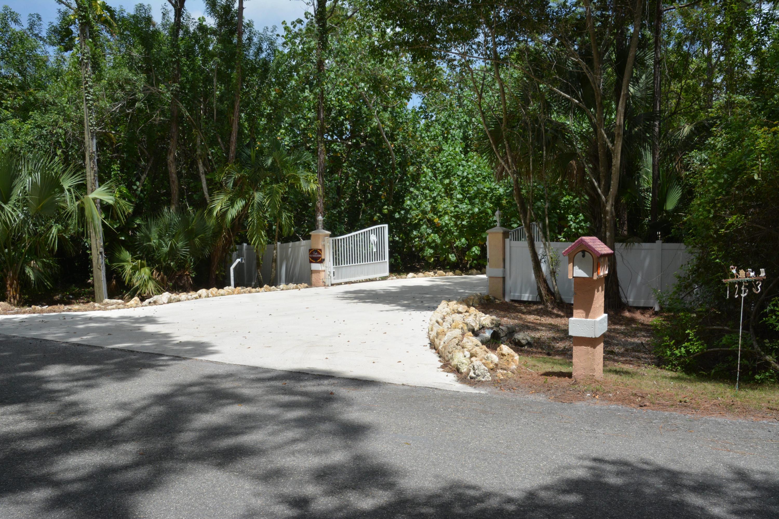 12563 Old Indiantown Road Jupiter, FL 33478 - Photo 4 of 36 Gated Entrance