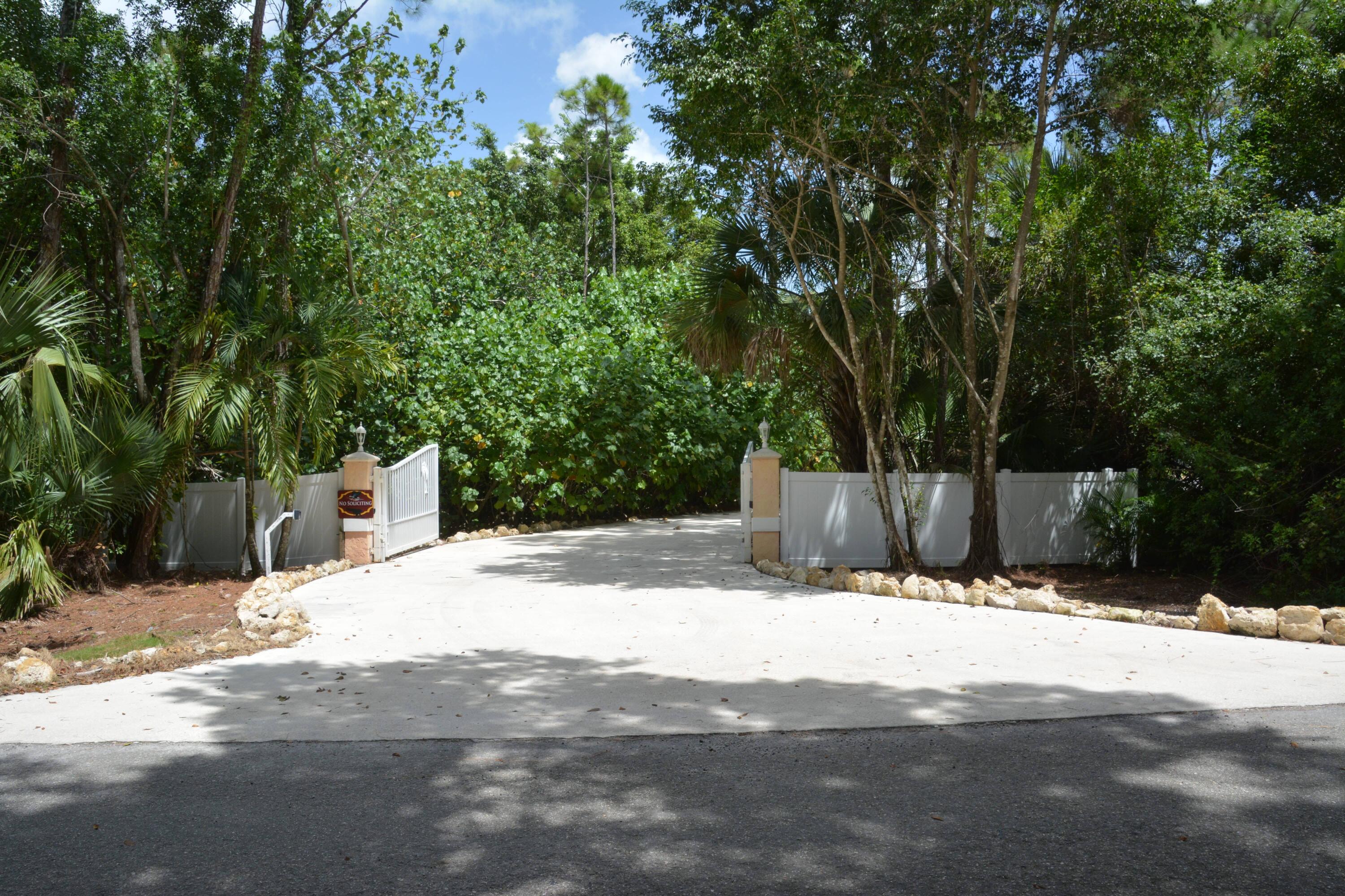 12563 Old Indiantown Road Jupiter, FL 33478 - Photo 5 of 36 Gated Entrance