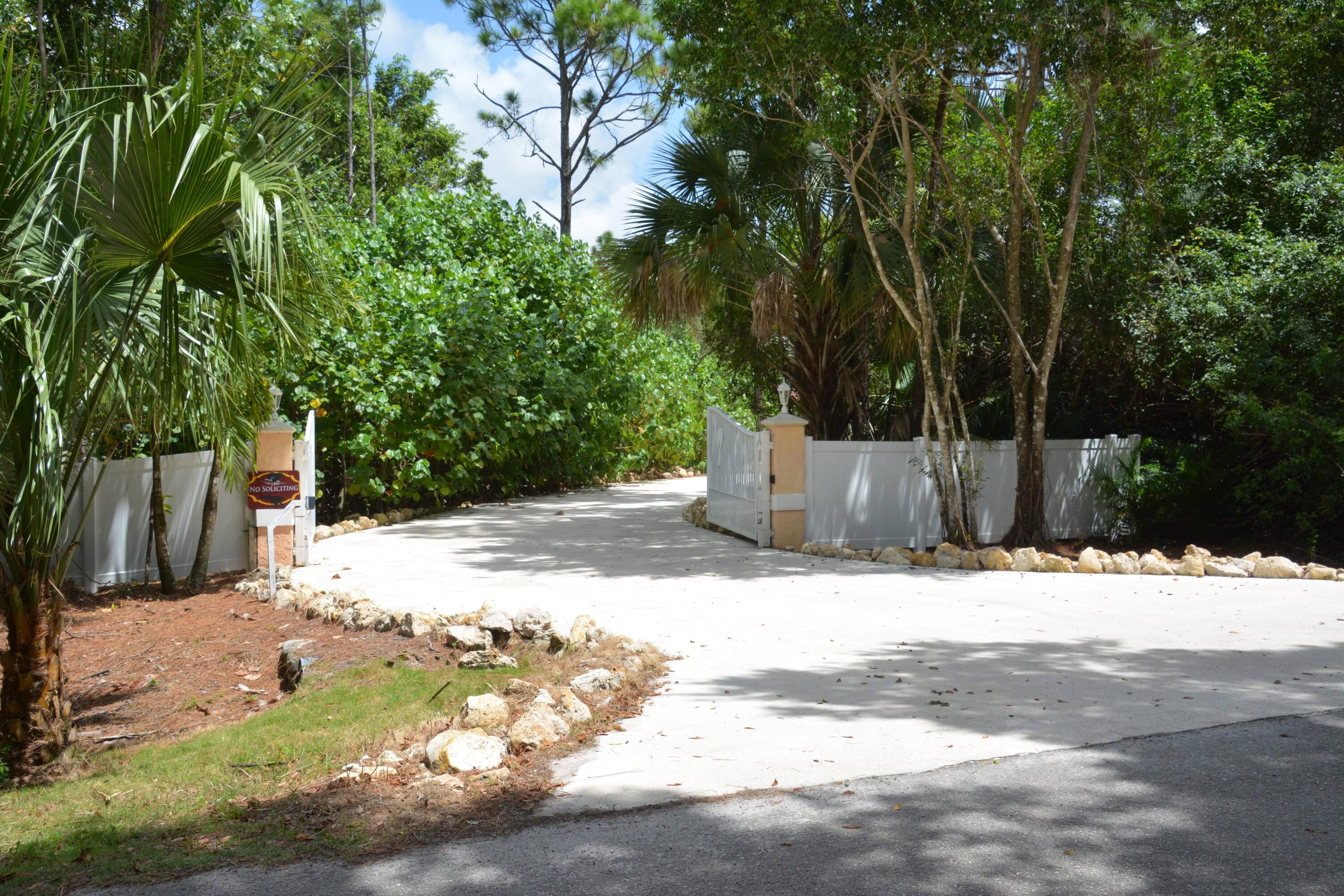 12563 Old Indiantown Road Jupiter, FL 33478 - Photo 6 of 36 Gated Entrance