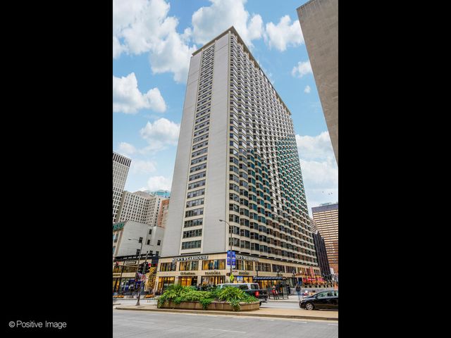 a view of a city with tall buildings