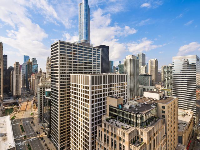 a view of a city with tall buildings