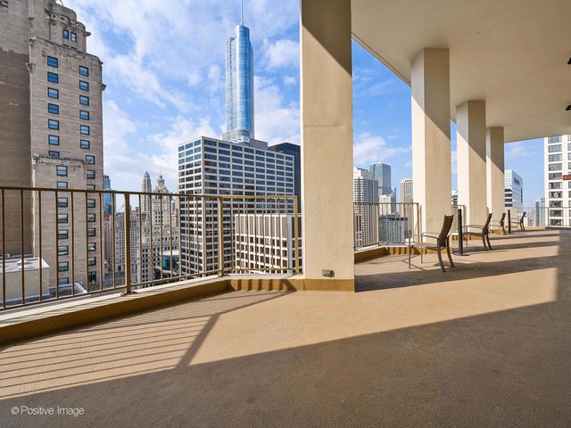 a view of a balcony with city view