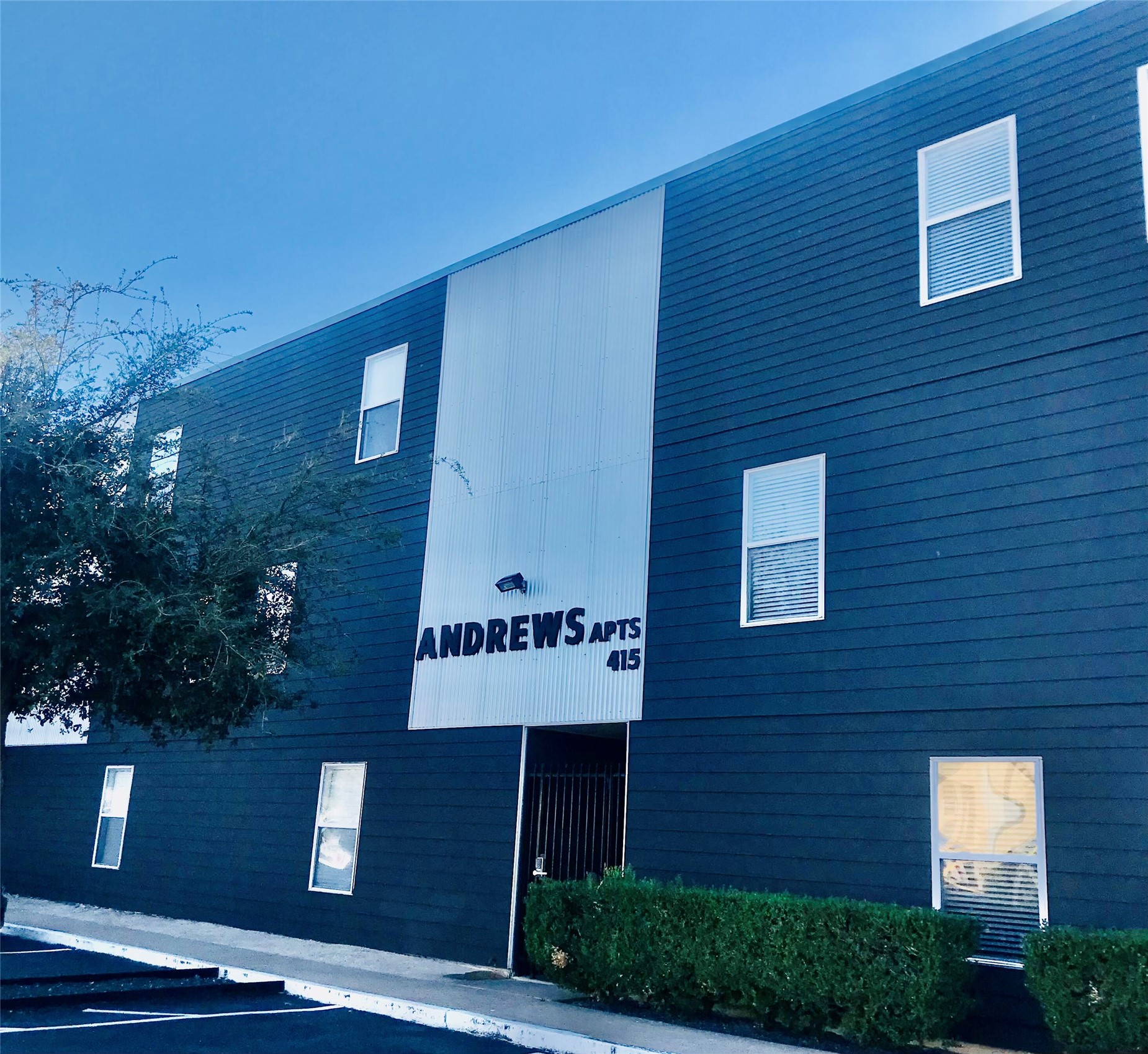 415 West 39th Street, Unit 209 Austin, TX 78751 - Photo 8 of 8 View of apartment building / complex with uncovered parking