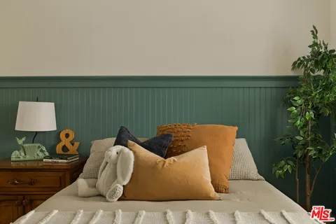 a view of balcony with couch and potted plant