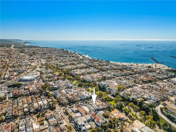 an aerial view of ocean and beach