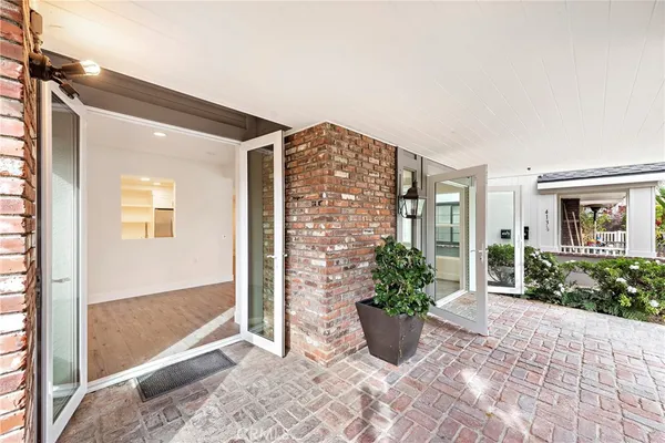 a view of entryway of house with potted plant