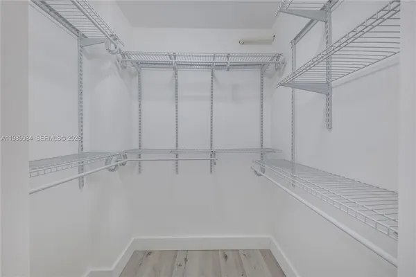 a view of a room with racks on the wall