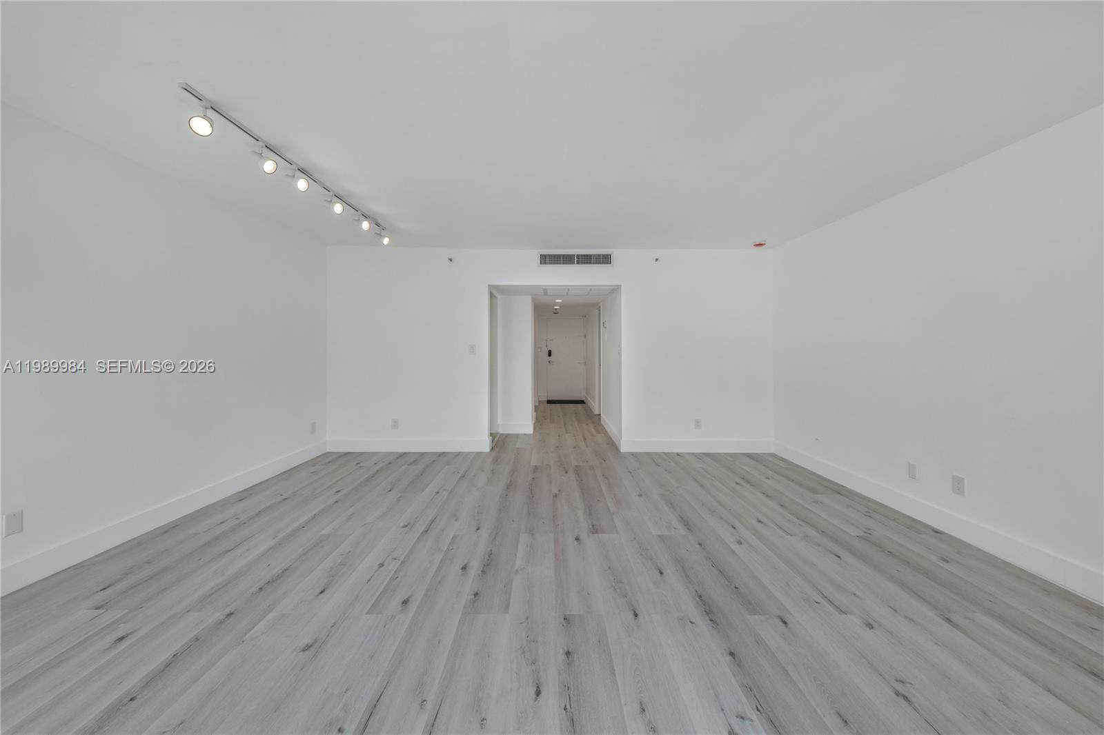 100 Lincoln Road, Unit 626 Miami Beach, FL 33139 - Photo 6 of 12 wooden floor in an empty room