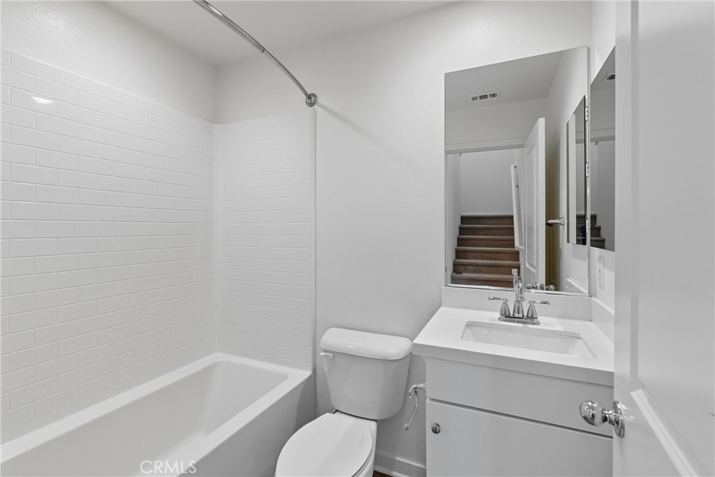 4211 Mission Ranch Way Oceanside, CA 92057 - Photo 12 of 40 a bathroom with a sink toilet and shower