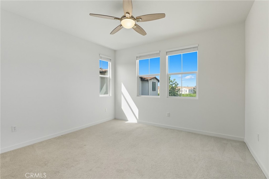 4211 Mission Ranch Way Oceanside, CA 92057 - Photo 16 of 40 an empty room with windows and fan