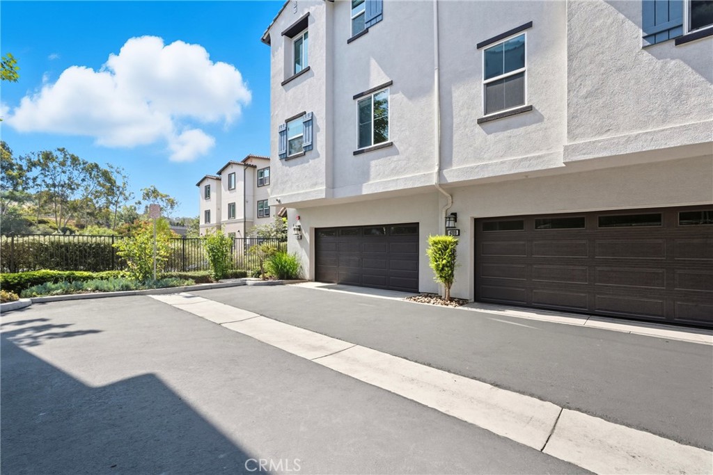 4211 Mission Ranch Way Oceanside, CA 92057 - Photo 27 of 40 a front view of a building with street