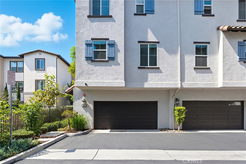 4211 Mission Ranch Way Oceanside, CA 92057 - Photo 28 of 40 a front view of a house with yard