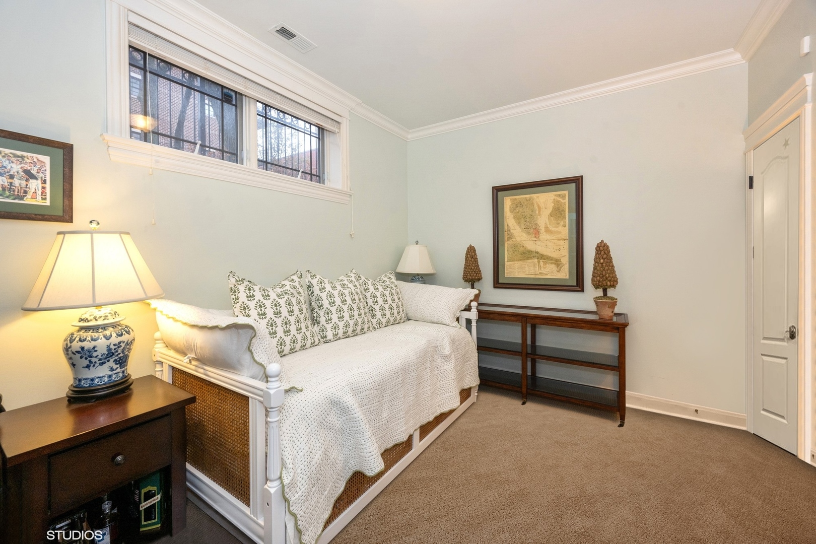 858 West Diversey Parkway, Unit 1W Chicago, IL 60614 - Photo 15 of 20 a bedroom with a bed and a night stand