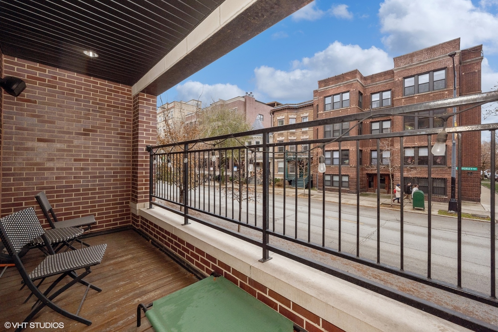 858 West Diversey Parkway, Unit 1W Chicago, IL 60614 - Photo 17 of 20 a view of a balcony with wooden floor