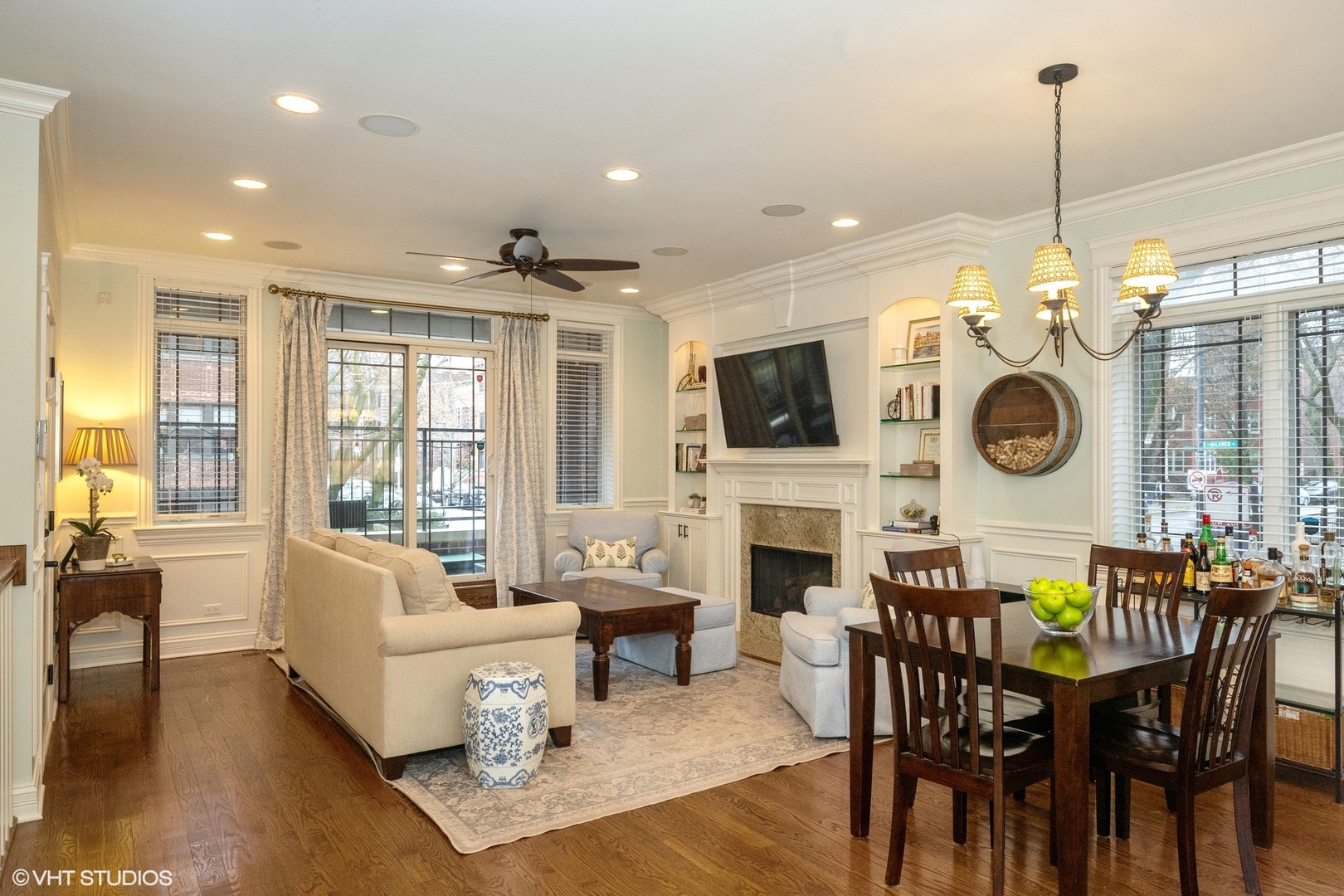 858 West Diversey Parkway, Unit 1W Chicago, IL 60614 - Photo 3 of 20 a living room with fireplace furniture and a flat screen tv