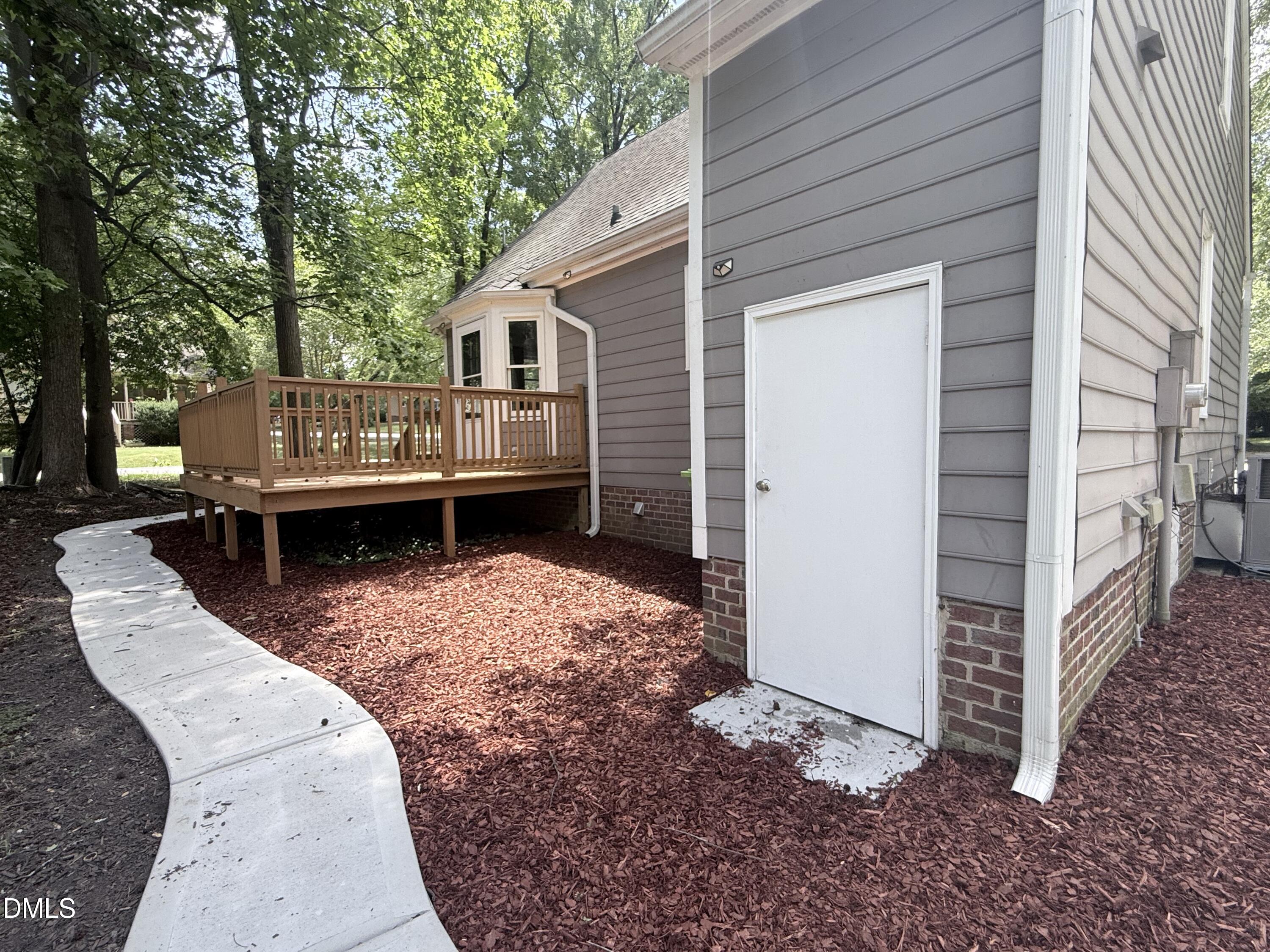2900 Broadlands Drive Raleigh, NC 27604 - Photo 8 of 60 a view of a house with backyard and sitting area