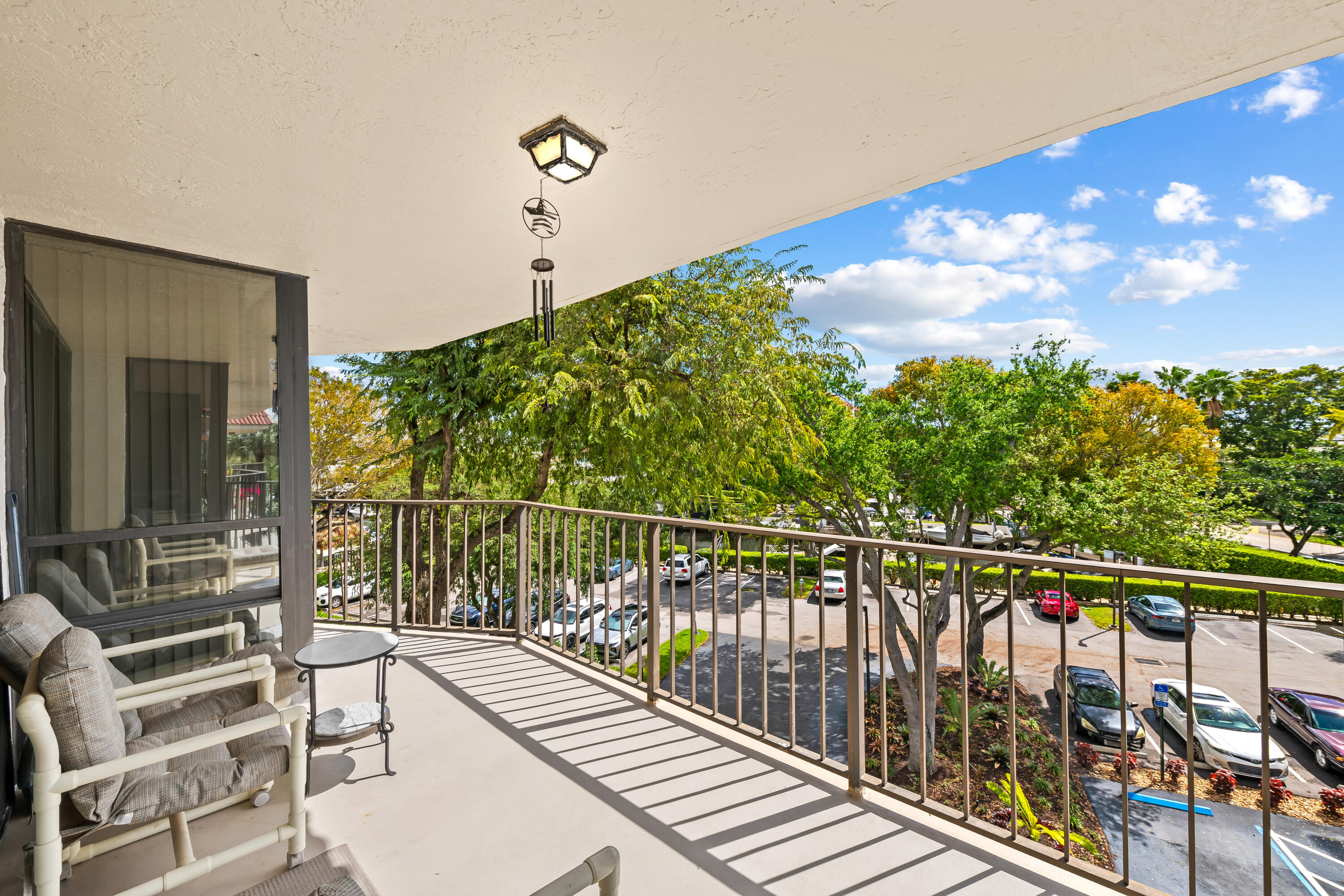 799 Jeffery Street, Unit 4050 Boca Raton, FL 33487 - Photo 1 of 39 a view of balcony with wooden floor