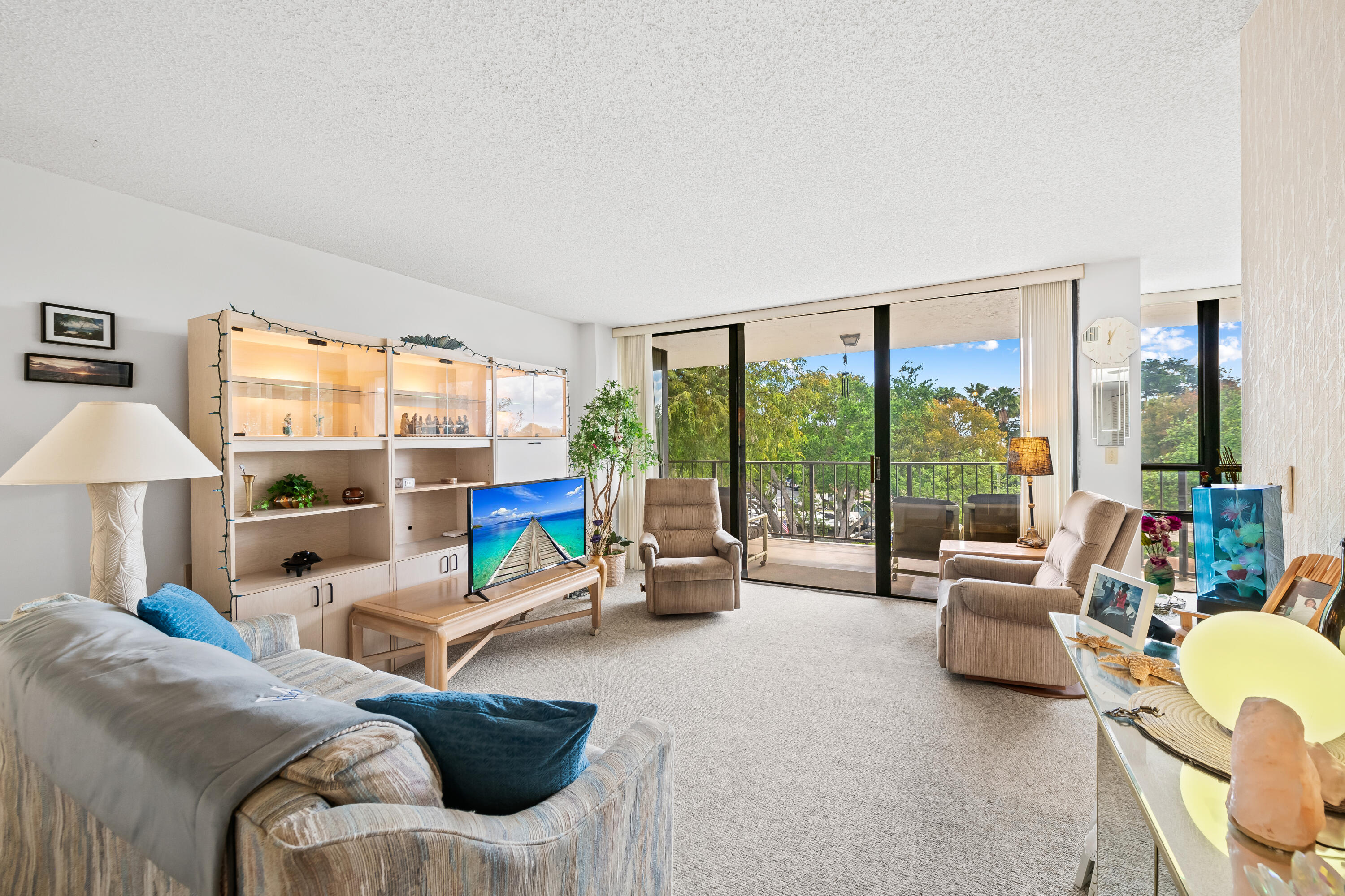 799 Jeffery Street, Unit 4050 Boca Raton, FL 33487 - Photo 13 of 39 a living room with furniture and a large window