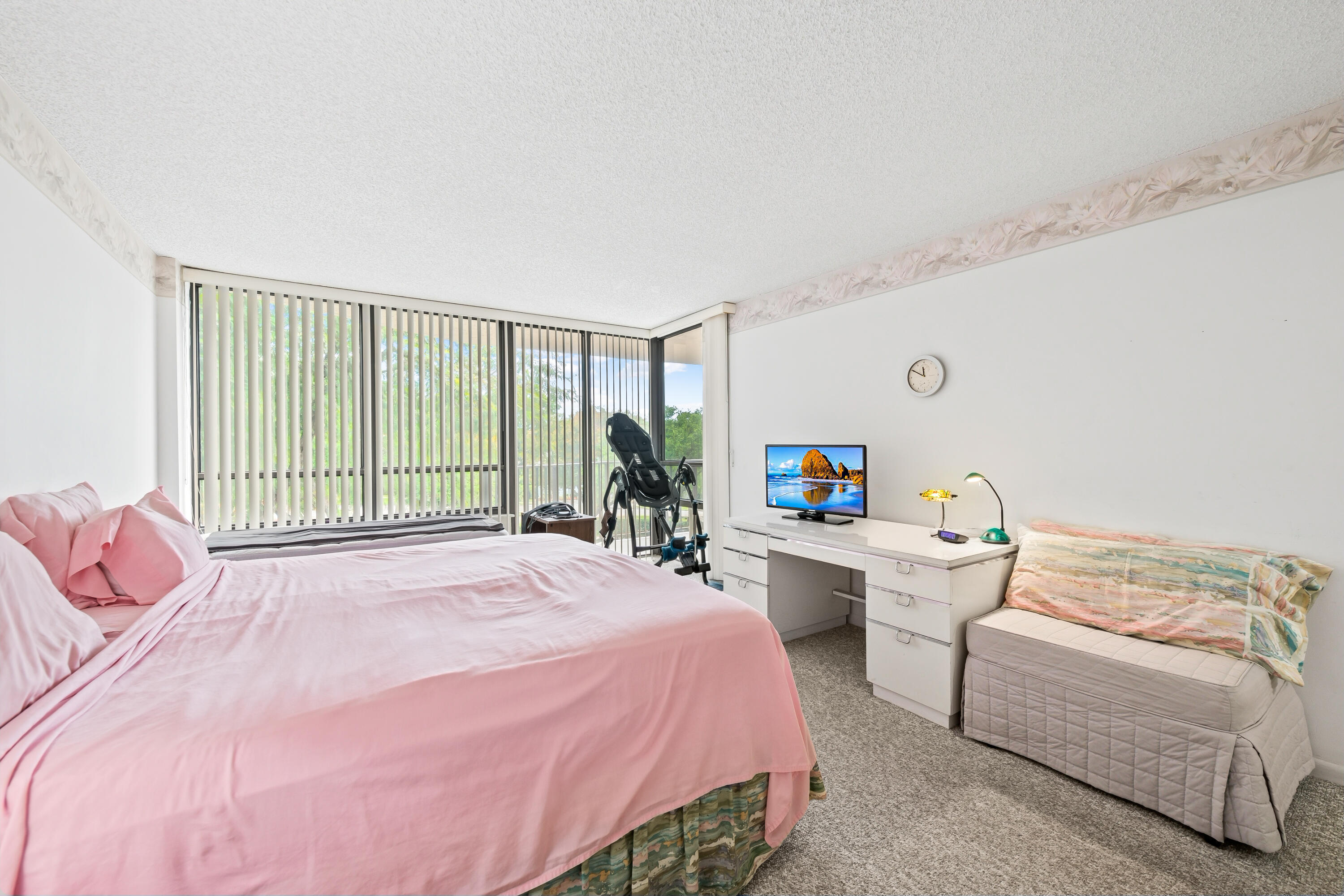 799 Jeffery Street, Unit 4050 Boca Raton, FL 33487 - Photo 16 of 39 a bedroom with a bed and a large window