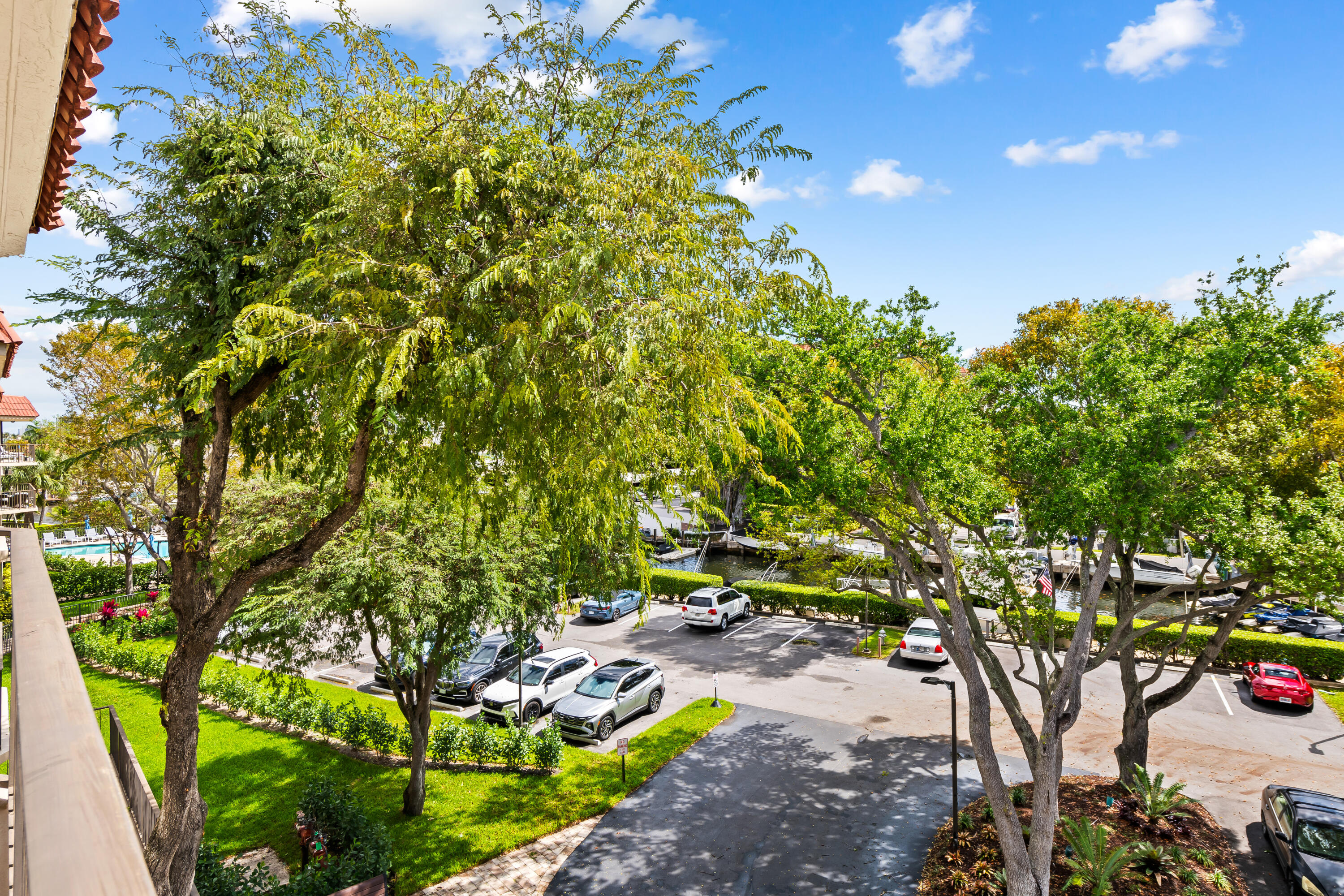 799 Jeffery Street, Unit 4050 Boca Raton, FL 33487 - Photo 3 of 39 a view of a tree with flower in front of it