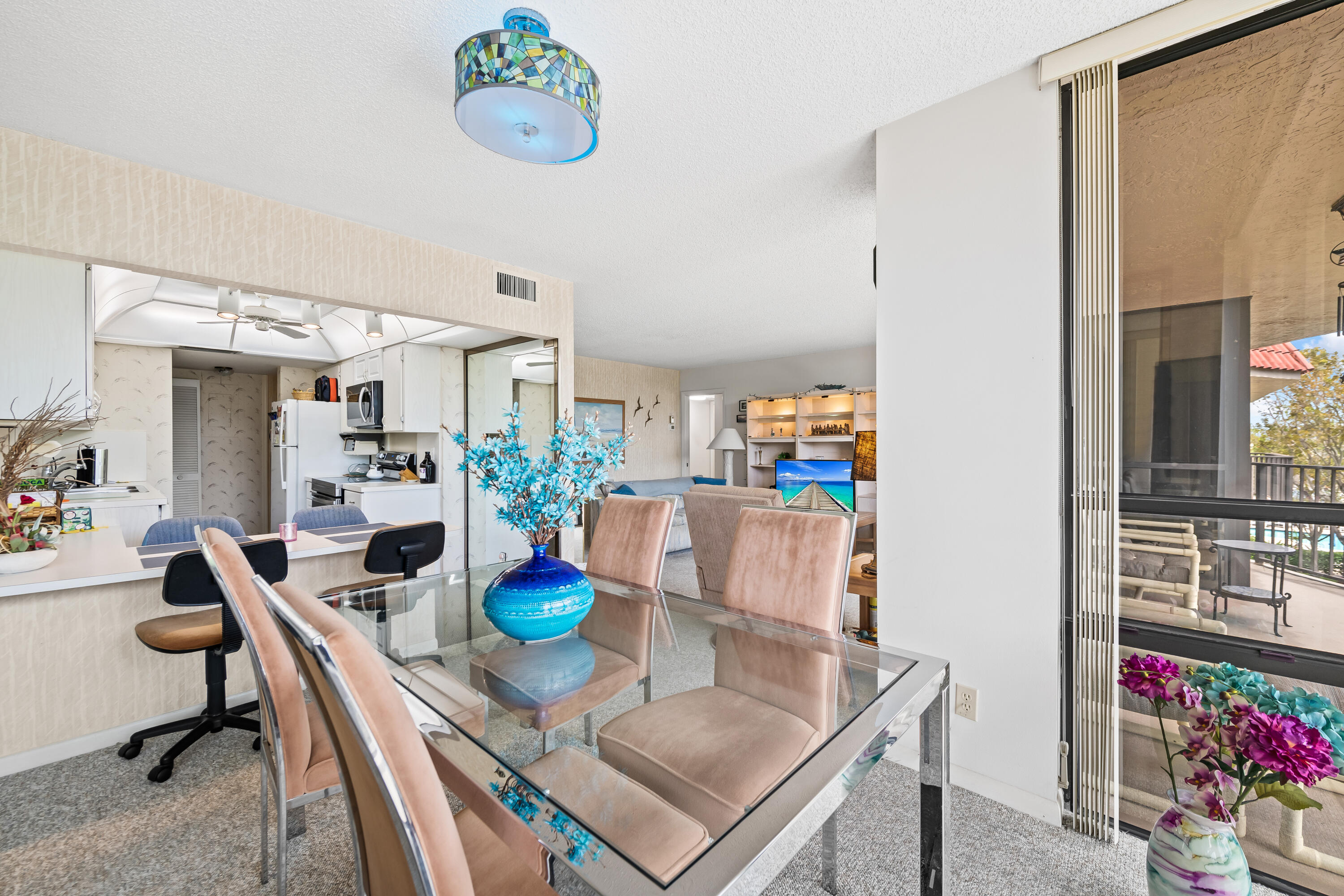 799 Jeffery Street, Unit 4050 Boca Raton, FL 33487 - Photo 10 of 39 a view of a dining room with furniture