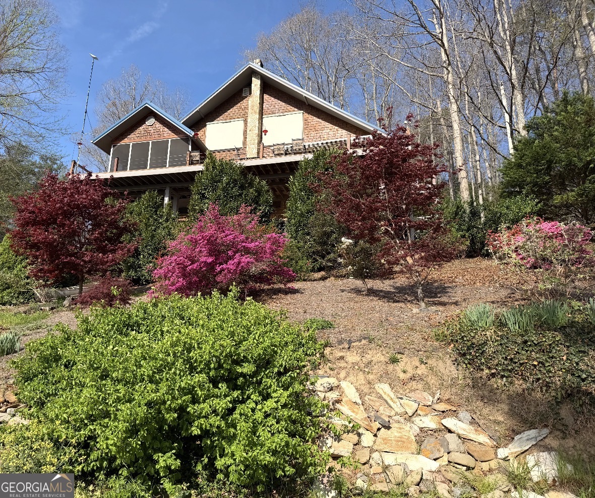 369 Deals Gap Road Robbinsville, NC 28771 - Photo 39 of 39 a front view of a house with a yard