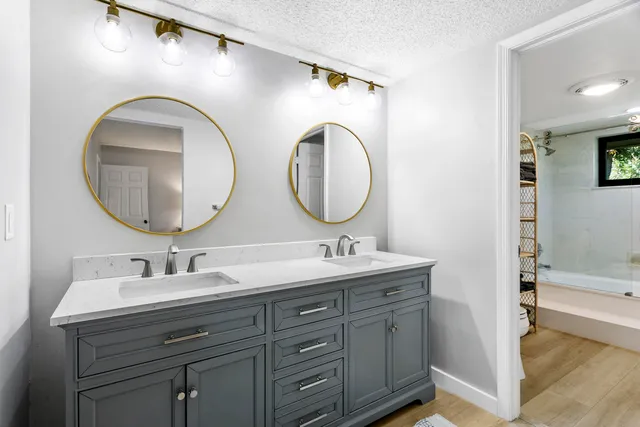 a room with a bed and a flat screen tv