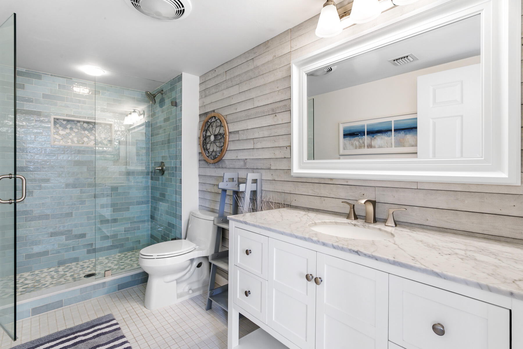 17137 Waterbend Drive, Unit 201 Jupiter, FL 33477 - Photo 24 of 43 a bathroom with a sink a toilet and shower