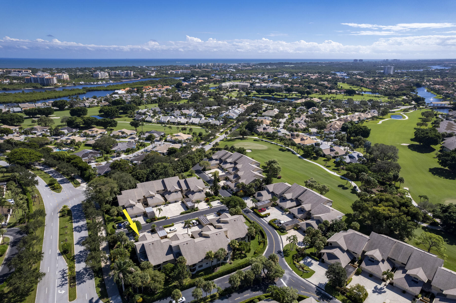 17137 Waterbend Drive, Unit 201 Jupiter, FL 33477 - Photo 40 of 43 an aerial view of residential houses with outdoor space