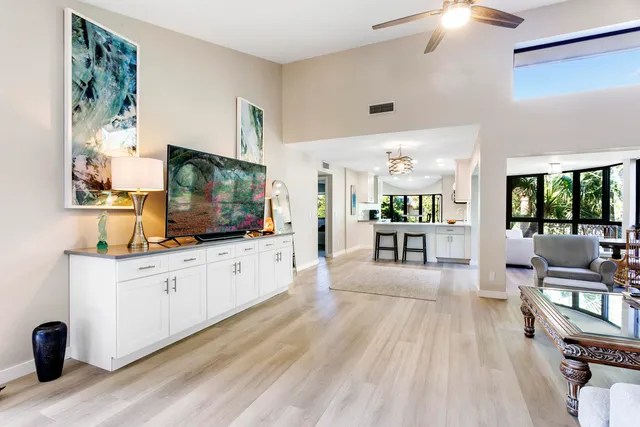 a living room with furniture and a table