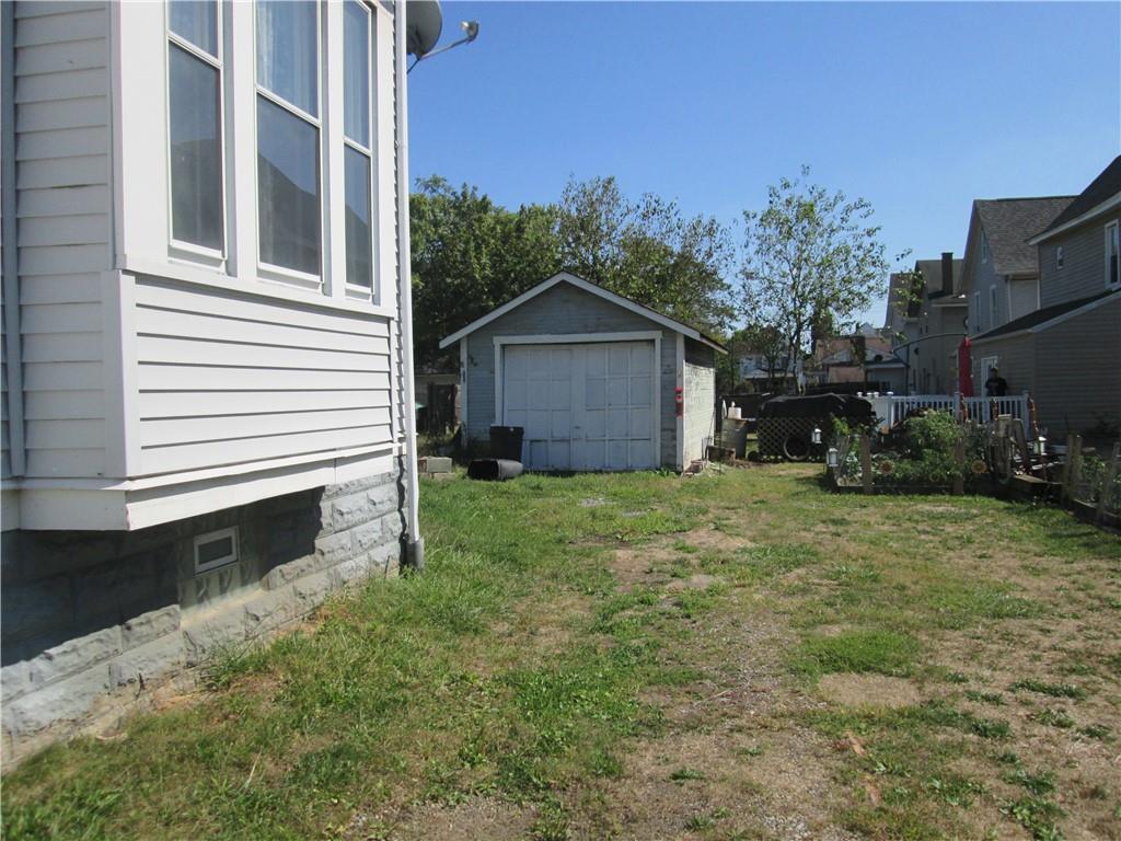 361 Reno Street Rochester, PA 15074 - Photo 3 of 21 a view of a house with a yard and a garage