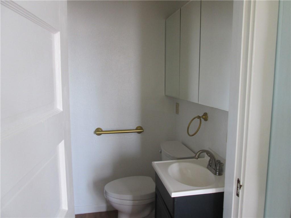 361 Reno Street Rochester, PA 15074 - Photo 10 of 21 a bathroom with a sink and toilet