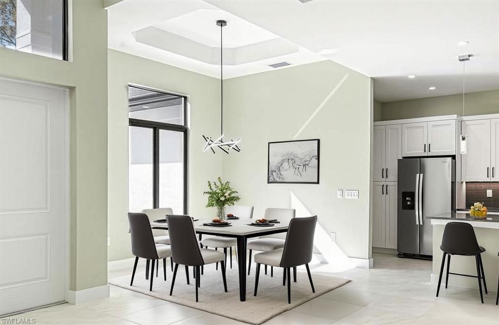 219 33rd Avenue Northwest Naples, FL 34120 - Photo 14 of 41 Virtually Staged Dining Area