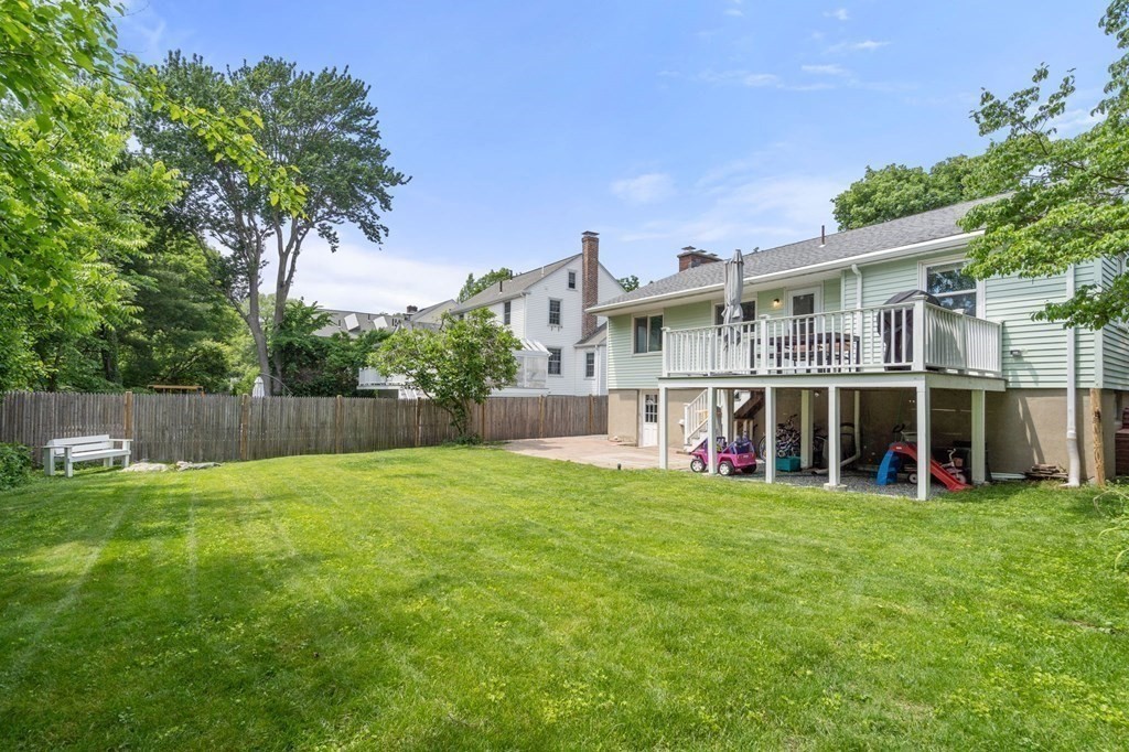 92 Oakdale Road Newton, MA 02459 - Photo 20 of 21 a view of a house with a yard and sitting area