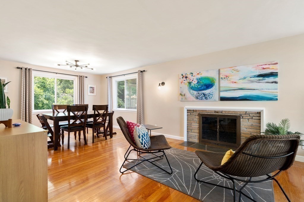 92 Oakdale Road Newton, MA 02459 - Photo 5 of 21 a living room with furniture and a fireplace