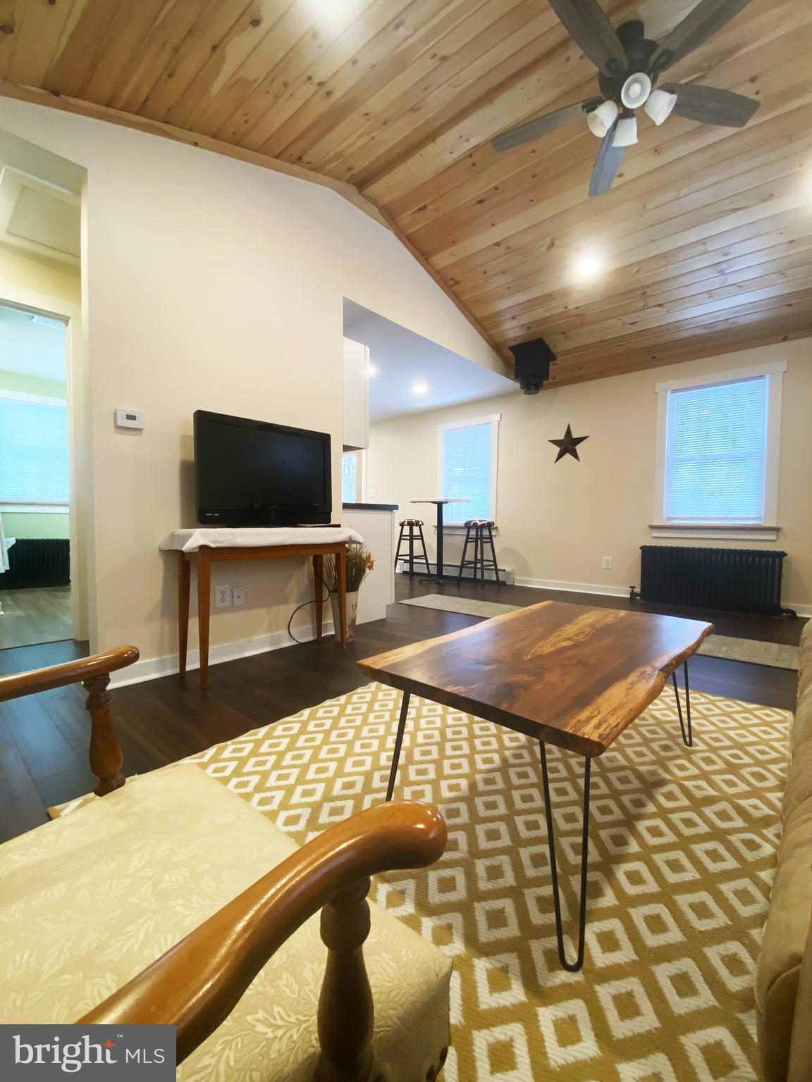1978 Leithsville Road Hellertown, PA 18055 - Photo 14 of 24 a lobby with a table and a flat screen tv