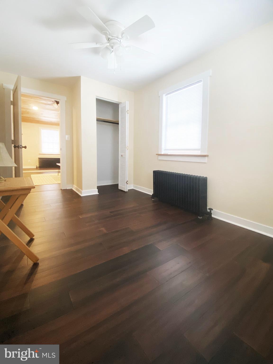 1978 Leithsville Road Hellertown, PA 18055 - Photo 21 of 24 an empty room with wooden floor and windows
