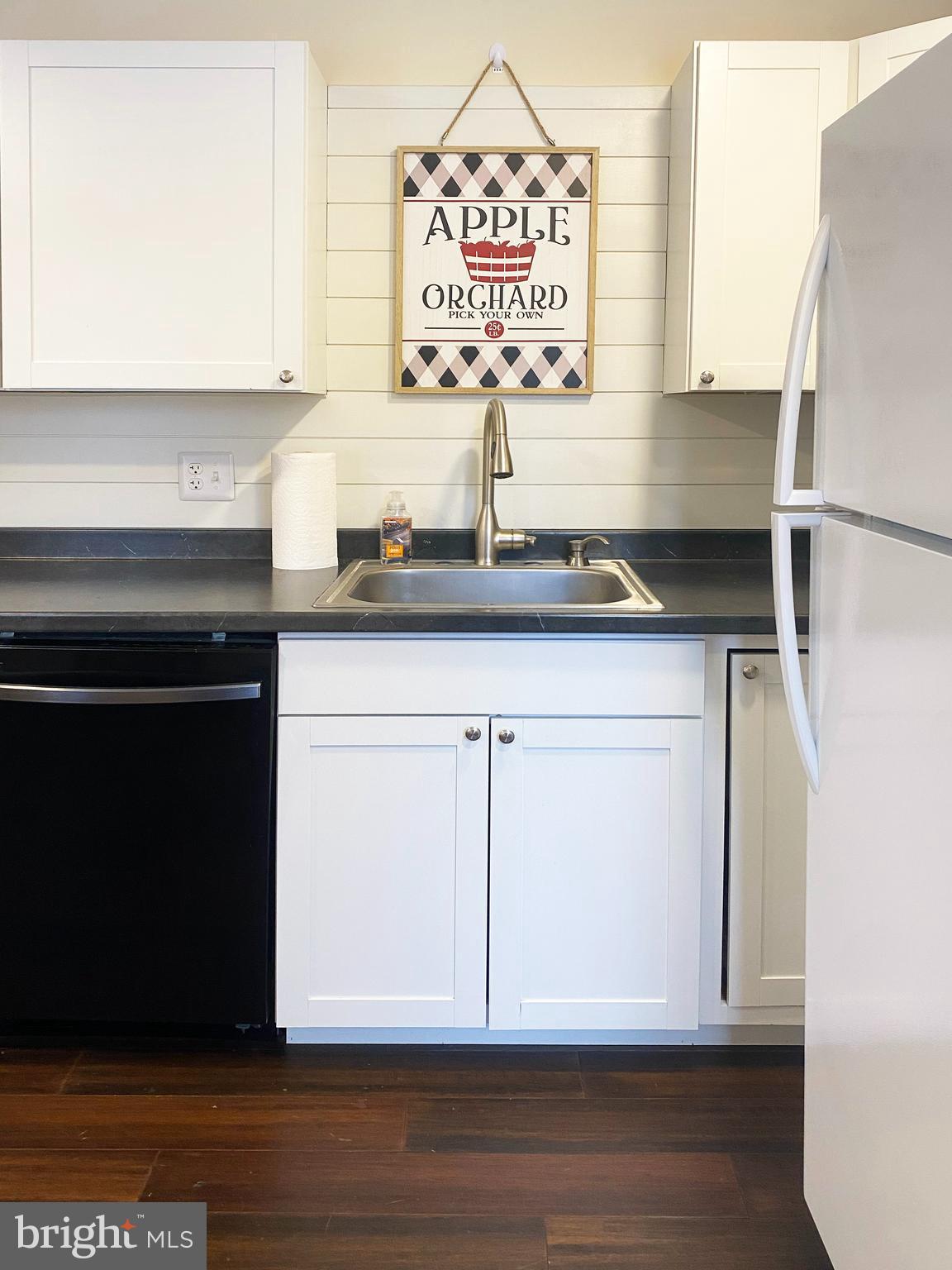1978 Leithsville Road Hellertown, PA 18055 - Photo 5 of 24 a kitchen with a sink cabinets and wooden floor