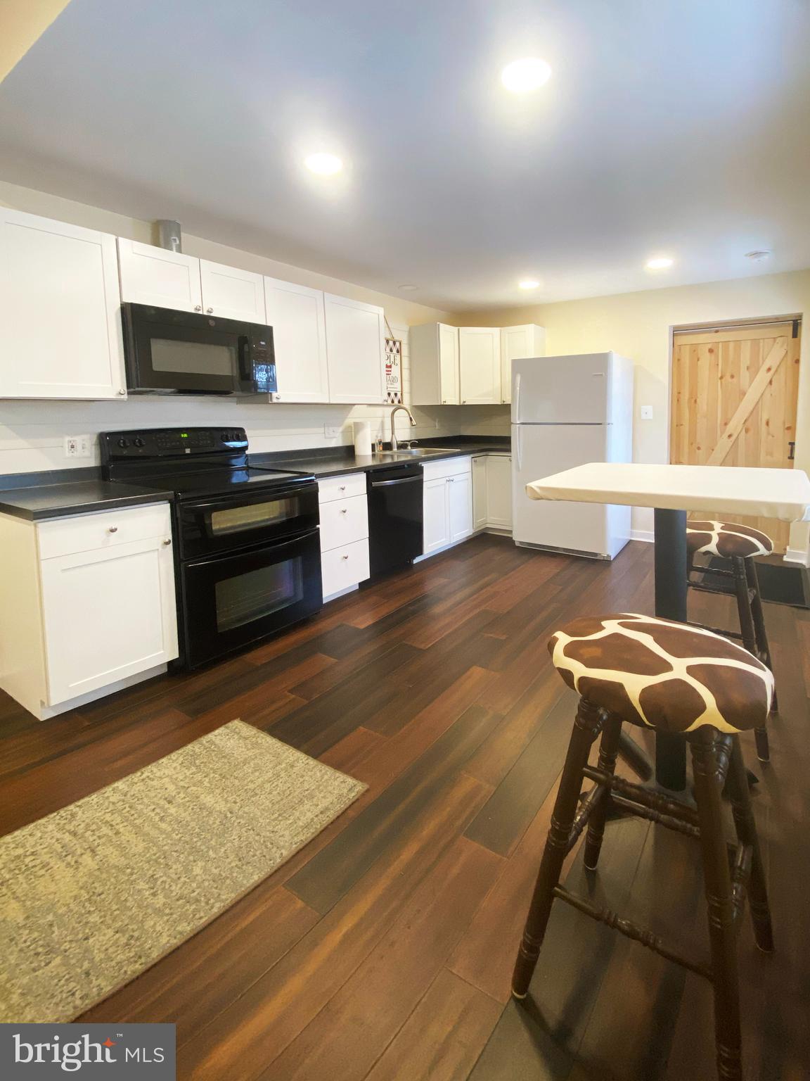 1978 Leithsville Road Hellertown, PA 18055 - Photo 6 of 24 a kitchen with stainless steel appliances granite countertop a stove and a sink