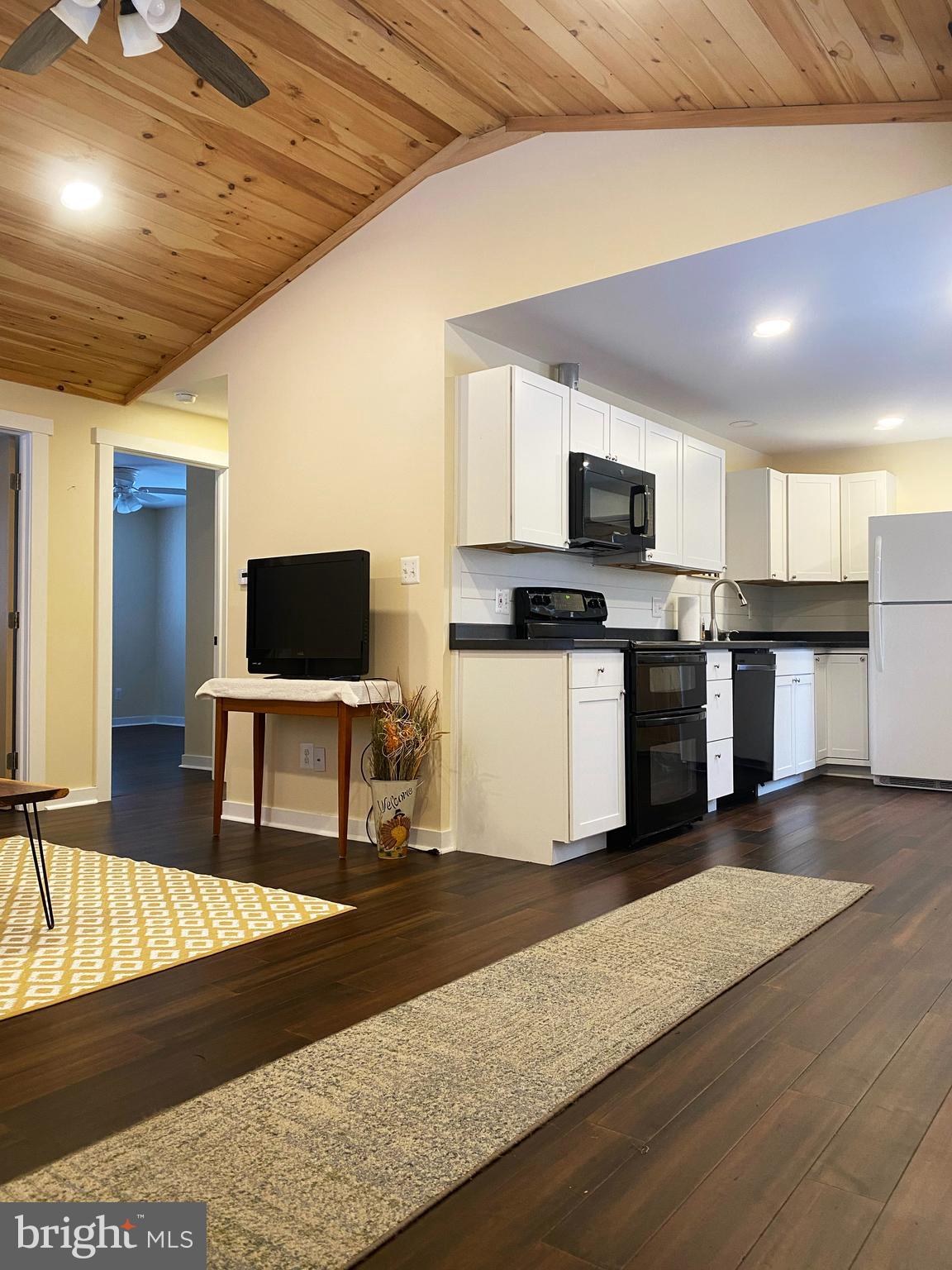 1978 Leithsville Road Hellertown, PA 18055 - Photo 9 of 24 a living room with stainless steel appliances furniture and a flat screen tv