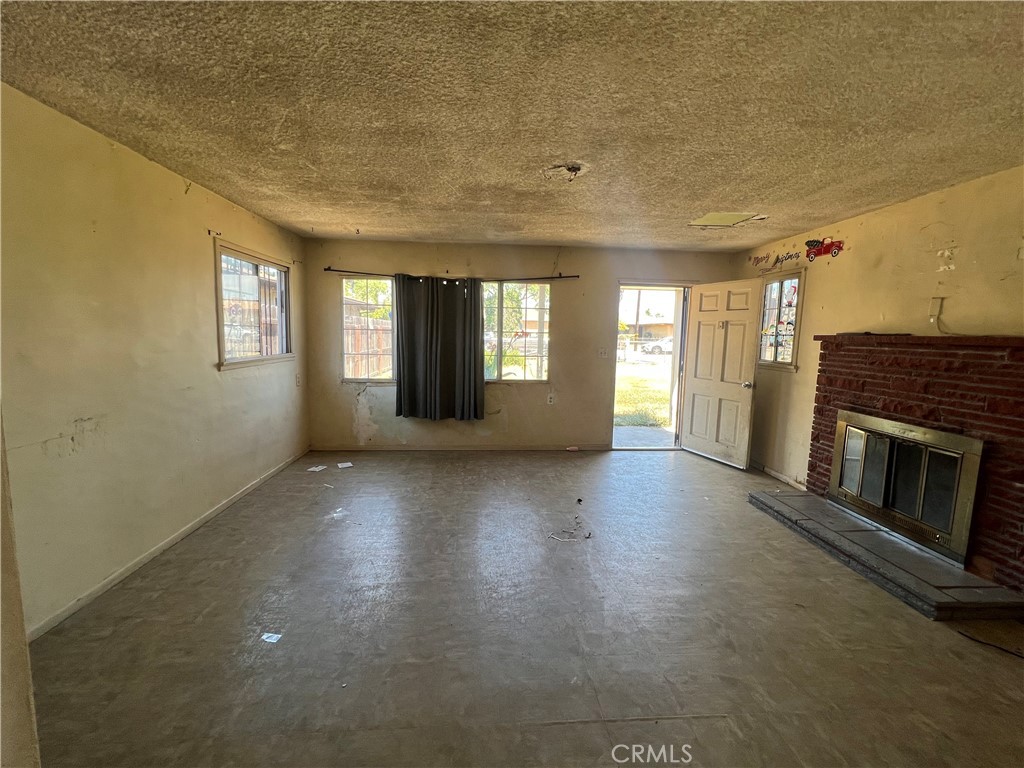 6942 Watcher Street Commerce, CA 90040 - Photo 2 of 14 a view of a livingroom with a fireplace