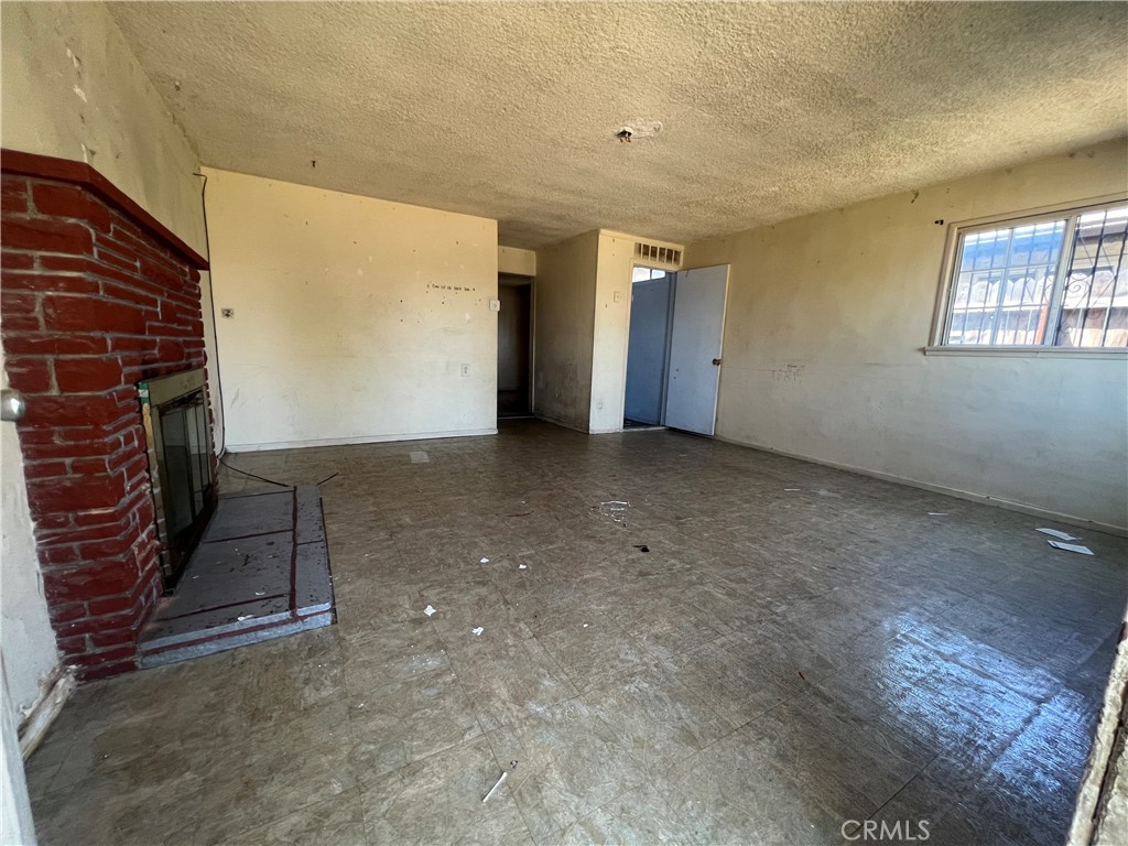 6942 Watcher Street Commerce, CA 90040 - Photo 3 of 14 a view of an empty room and window