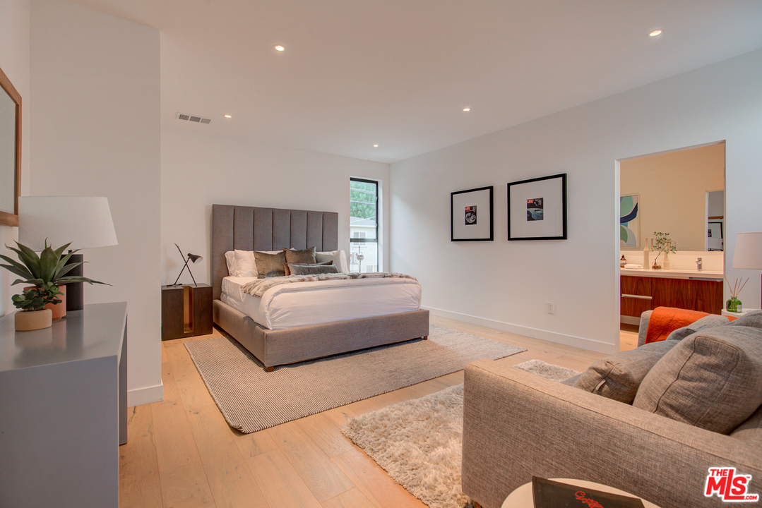 6876 Pacific View Drive Los Angeles, CA 90068 - Photo 25 of 31 a living room with furniture and a couch